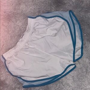 Nike Dri-FIT White Shorts with Blue Accents